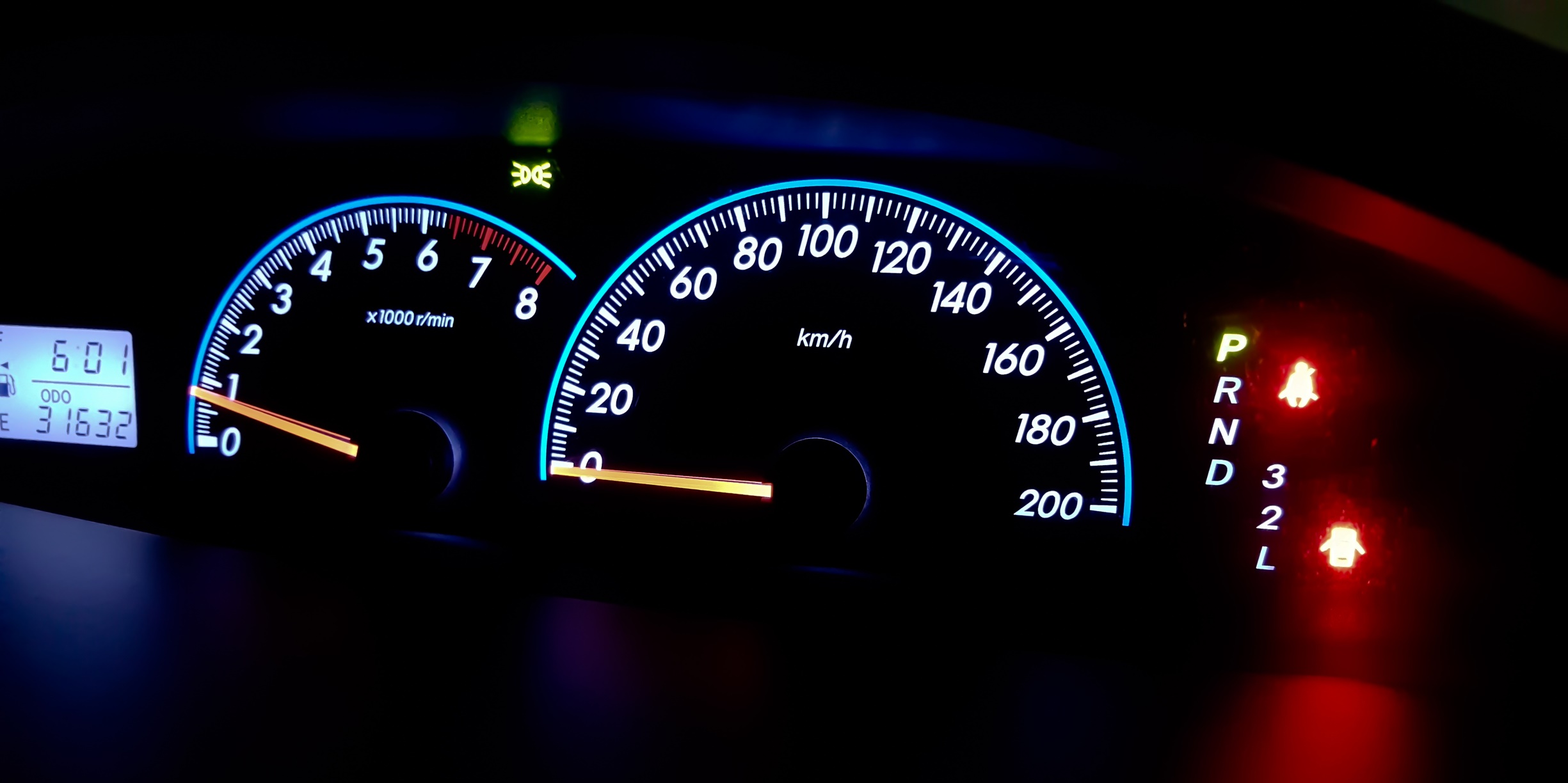 Modern car illuminated dashboard closeup